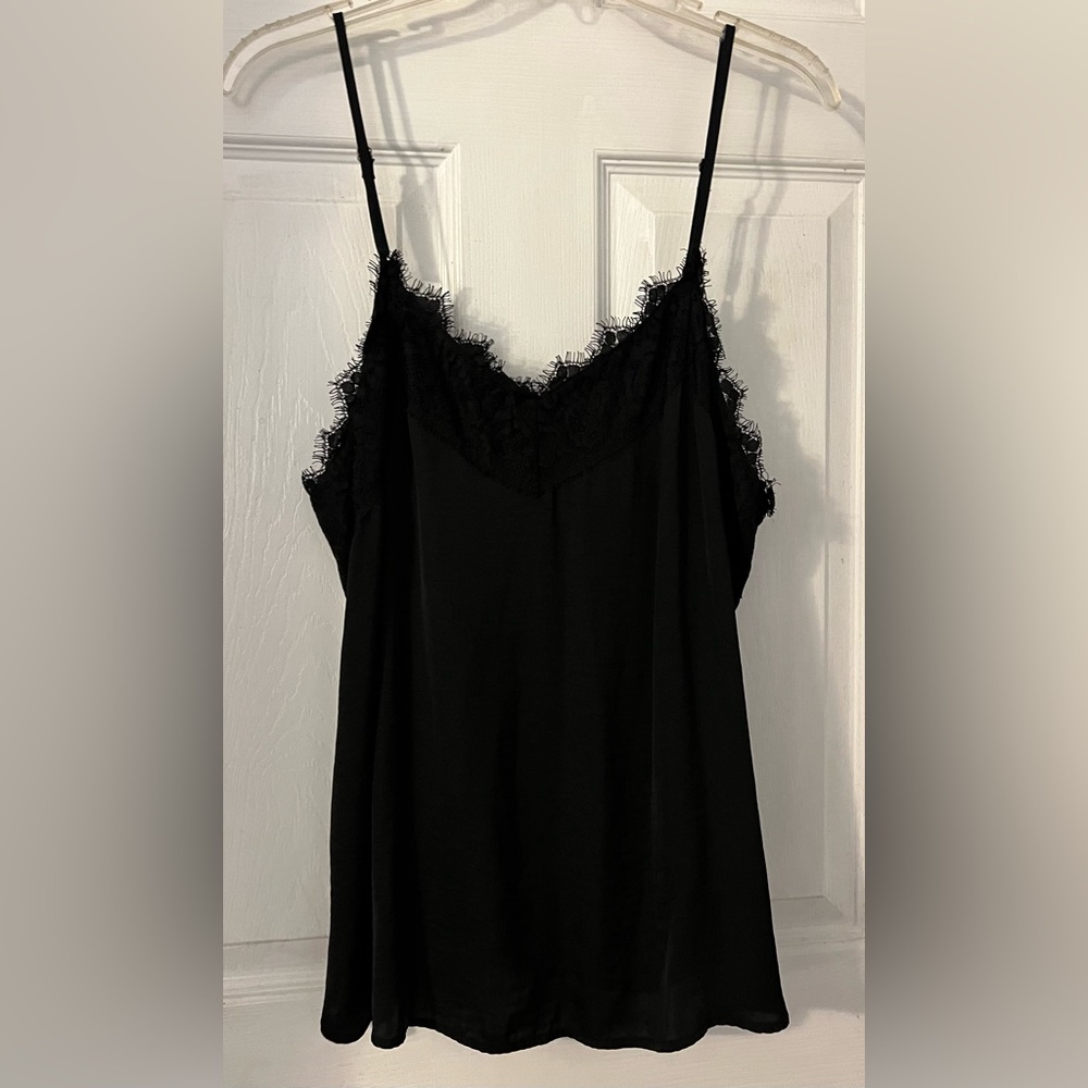 NWOT never worn black cami with beautiful trim